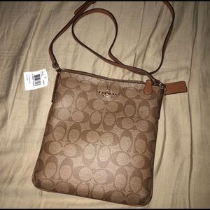 Brown Coach crossbody bag